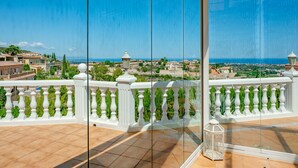 A balcony with a clear view of a coastal town and the sea. - Marques by Interhome (Dénia)