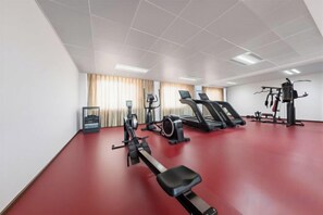 A gym with treadmills, stationary bikes, and rowing machines. - Zhongyouyuan Hotel (Beijing Niujie Metro Station Xuanwu Hospital Branch (Beijing)