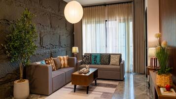 Superior Apartment, 2 Bedrooms, Kitchen, City View | Living area | 35-inch Smart TV with digital channels