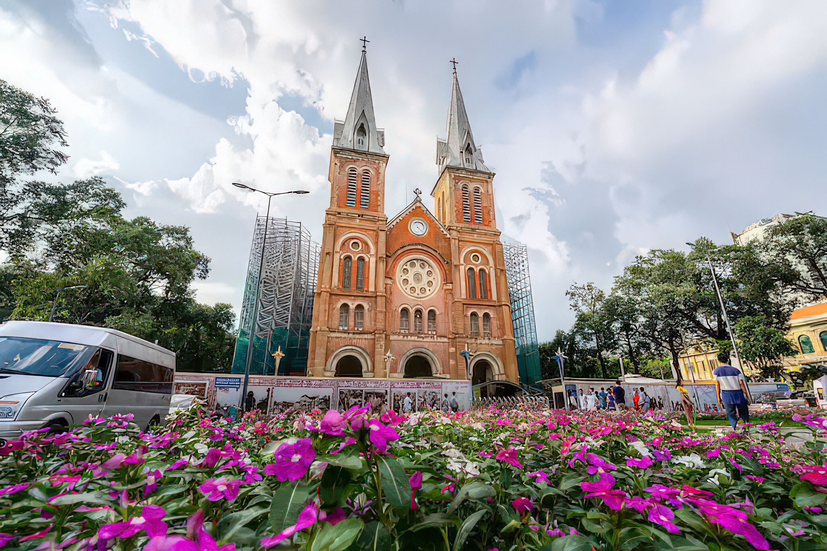 A large church with two towers and a clock in the center.