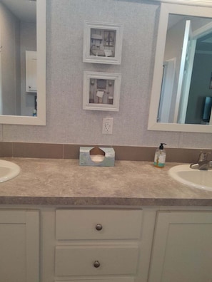 Shower, towels, soap, toilet paper