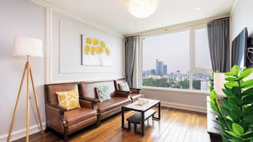 Superior Apartment, 2 Bedrooms, Kitchen, City View | Living area | 35-inch TV with cable channels