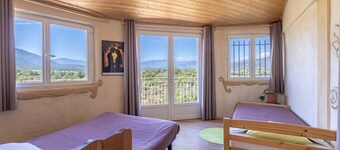 Gite con dormitorio, vista lago, giardino privato e balcone