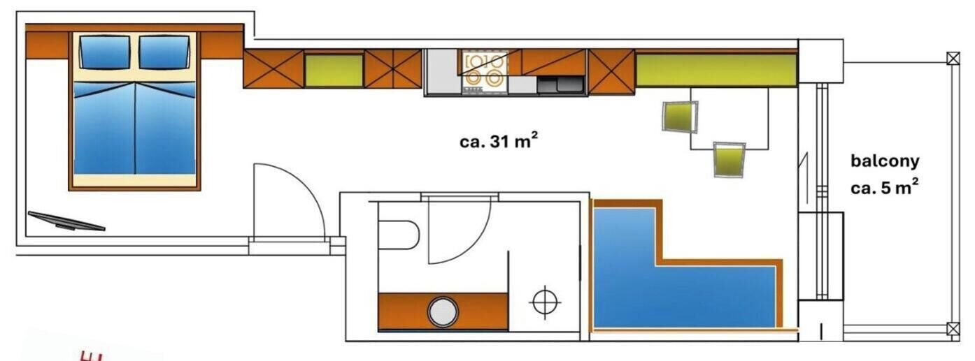 Plano de planta que muestra una cocina, un balcón y un baño.