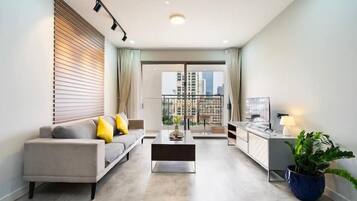 Superior Apartment, 3 Bedrooms, Kitchen, City View | Living area | 35-inch TV with cable channels