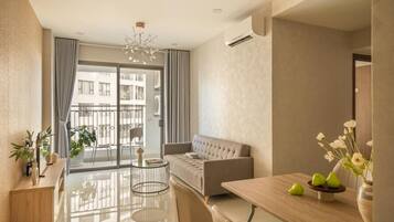 Superior Apartment, 2 Bedrooms, Kitchen, City View | Living area | 35-inch TV with cable channels