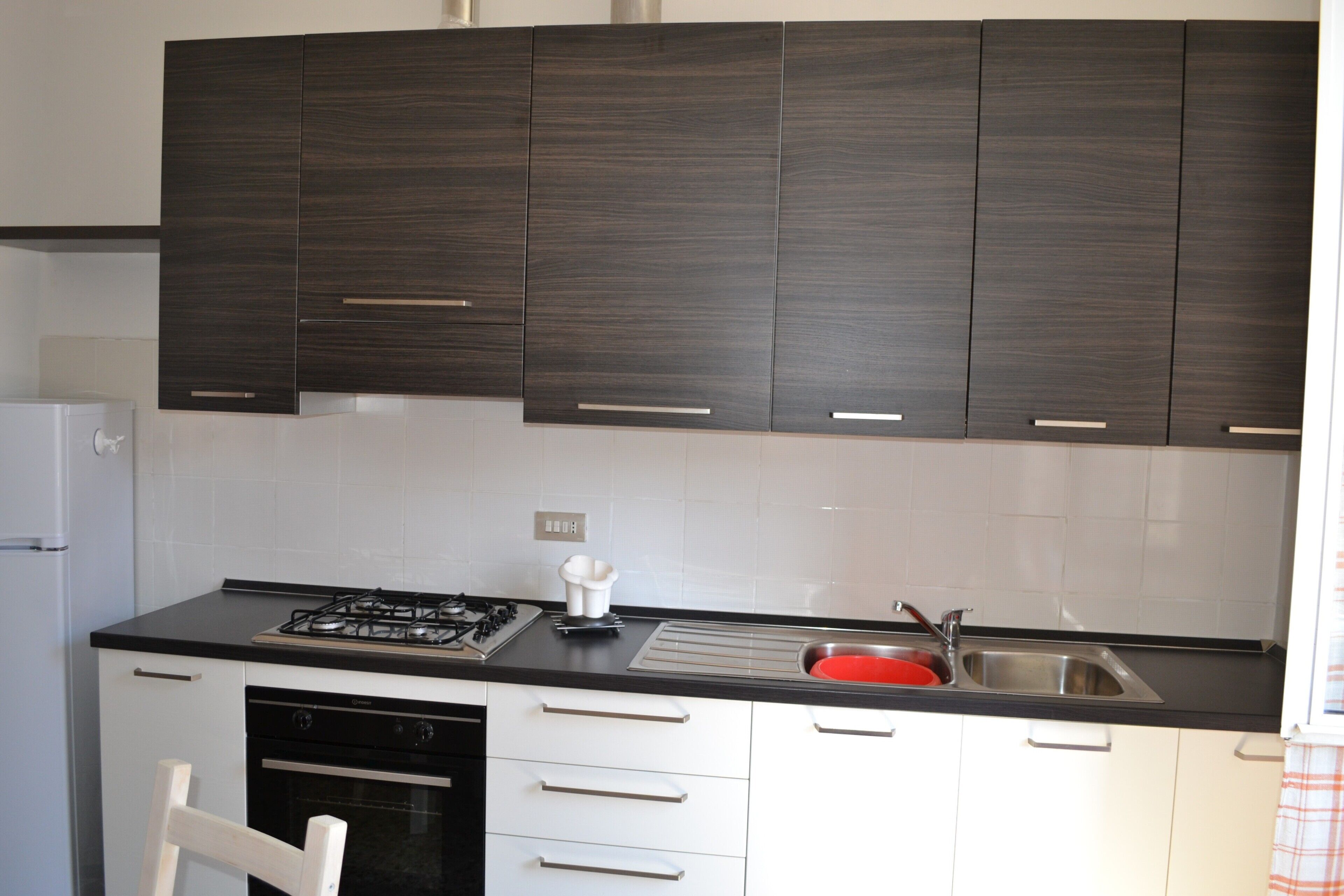 Fridge, microwave, stovetop, cookware/dishes/utensils