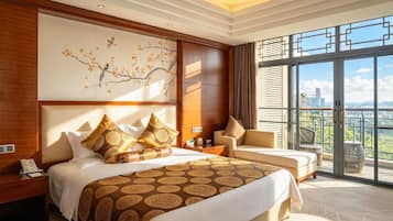 A hotel room with a large bed, a sofa, a balcony with a city view, and a decorative wall.