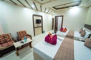 Premium bedding, desk, laptop workspace, soundproofing