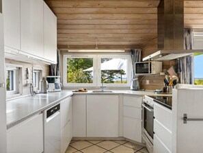 Fridge, microwave, dishwasher, cookware/dishes/utensils