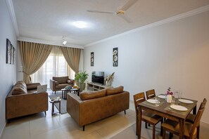 50-inch TV with cable channels - Marjaan Apartments (Mombasa)