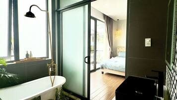 Shower, hair dryer, slippers, towels