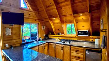Fridge, microwave, toaster, cookware/dishes/utensils