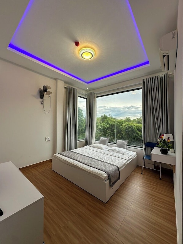 Standard Room, City View | Minibar, free WiFi, bed sheets