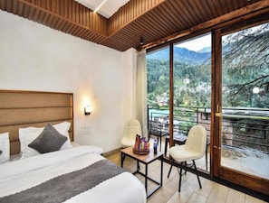 Deluxe Room, Balcony, Mountain View | Desk, laptop workspace, iron/ironing board, free WiFi