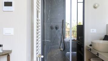 Premium Suite, City View | Bathroom | Shower, rainfall showerhead, free toiletries, hair dryer