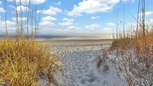 A beach with sand dunes and a clear sky. - Sea Blue Suite at Tilghman w Pool and Hot Tub (North Myrtle Beach)