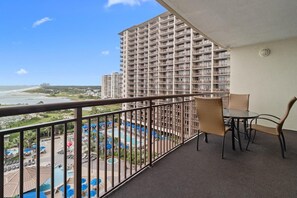 Outdoor dining - Beachfront Haven: 2BR Condo with King & Queen Beds (North Myrtle Beach)