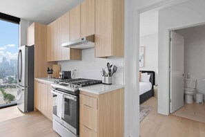 Coffee/tea maker, fridge, microwave, oven
