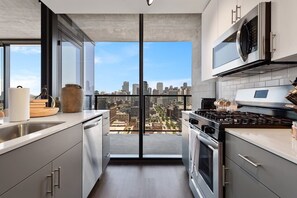 Fridge, microwave, oven, stovetop - Chic Fulton Market Oasis + Curated Comfort & Style (Chicago)