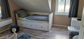 4 bedrooms, desk, iron/ironing board, travel cot
