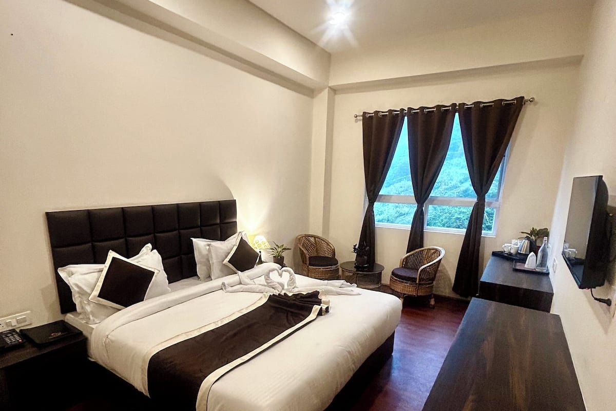 Premium bedding, memory-foam beds, desk, laptop workspace