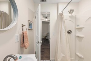 Shower, hair dryer, towels