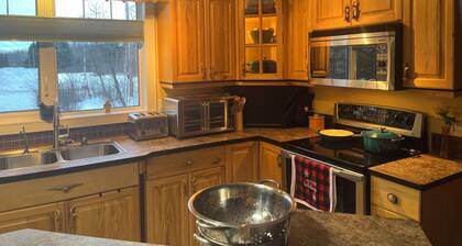 Spacious Lake Front Chalet on Golf Resort- 3 minutes from Iron Horse Trail!