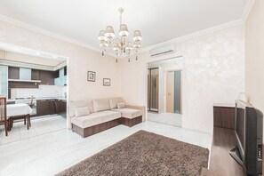 Apartment, City View | Living area | 39-inch LCD TV with cable channels - Minsk Apartments on Lenina str  (Minsk)