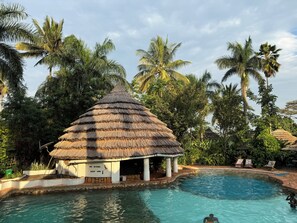 Outdoor pool, open 10:00 AM to 7:00 PM, sun loungers, lifeguards on site