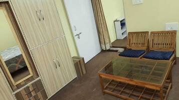 Deluxe Double Room, River View | Living area | Flat-screen TV