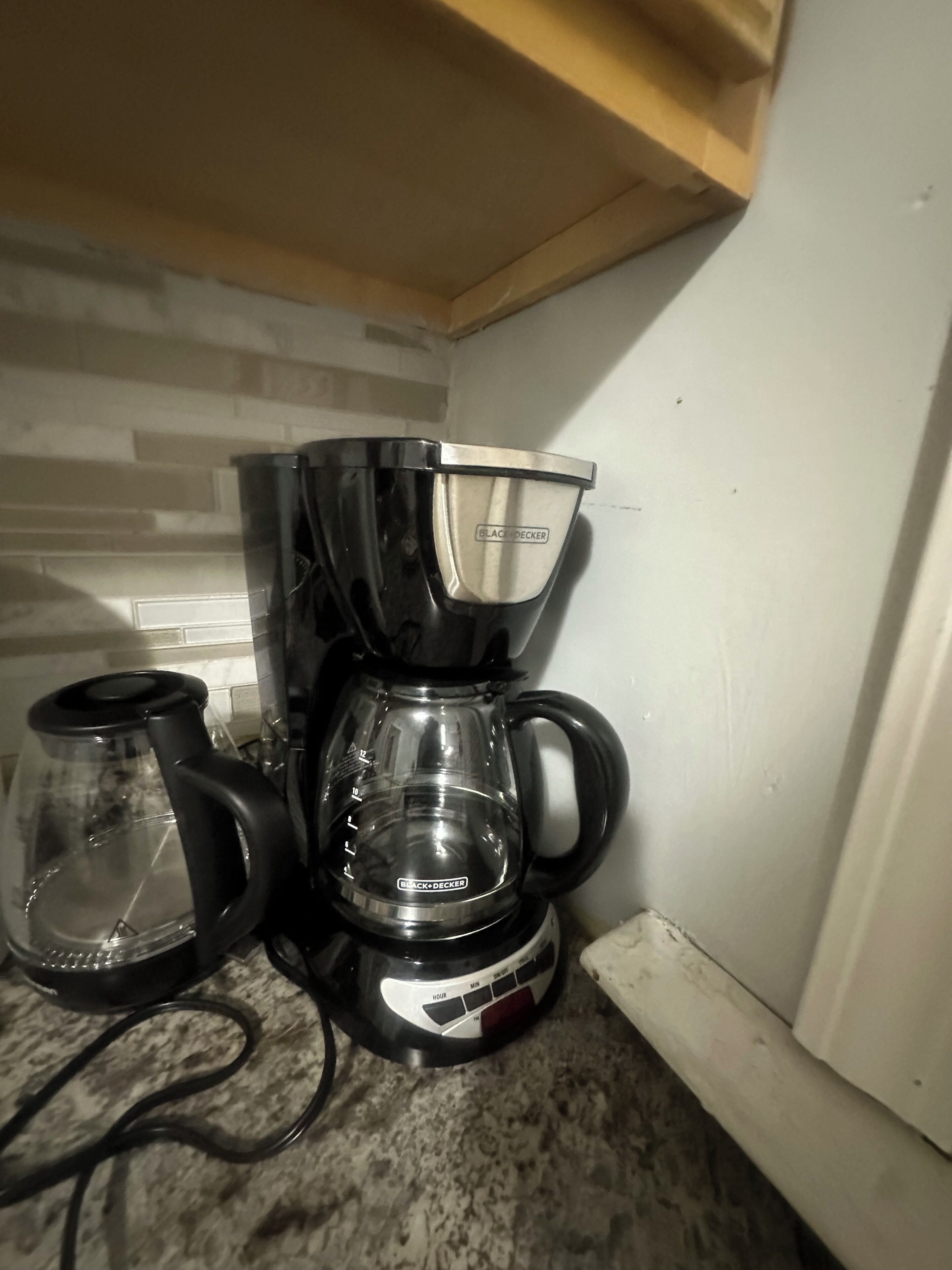 A coffee maker on a kitchen counter.