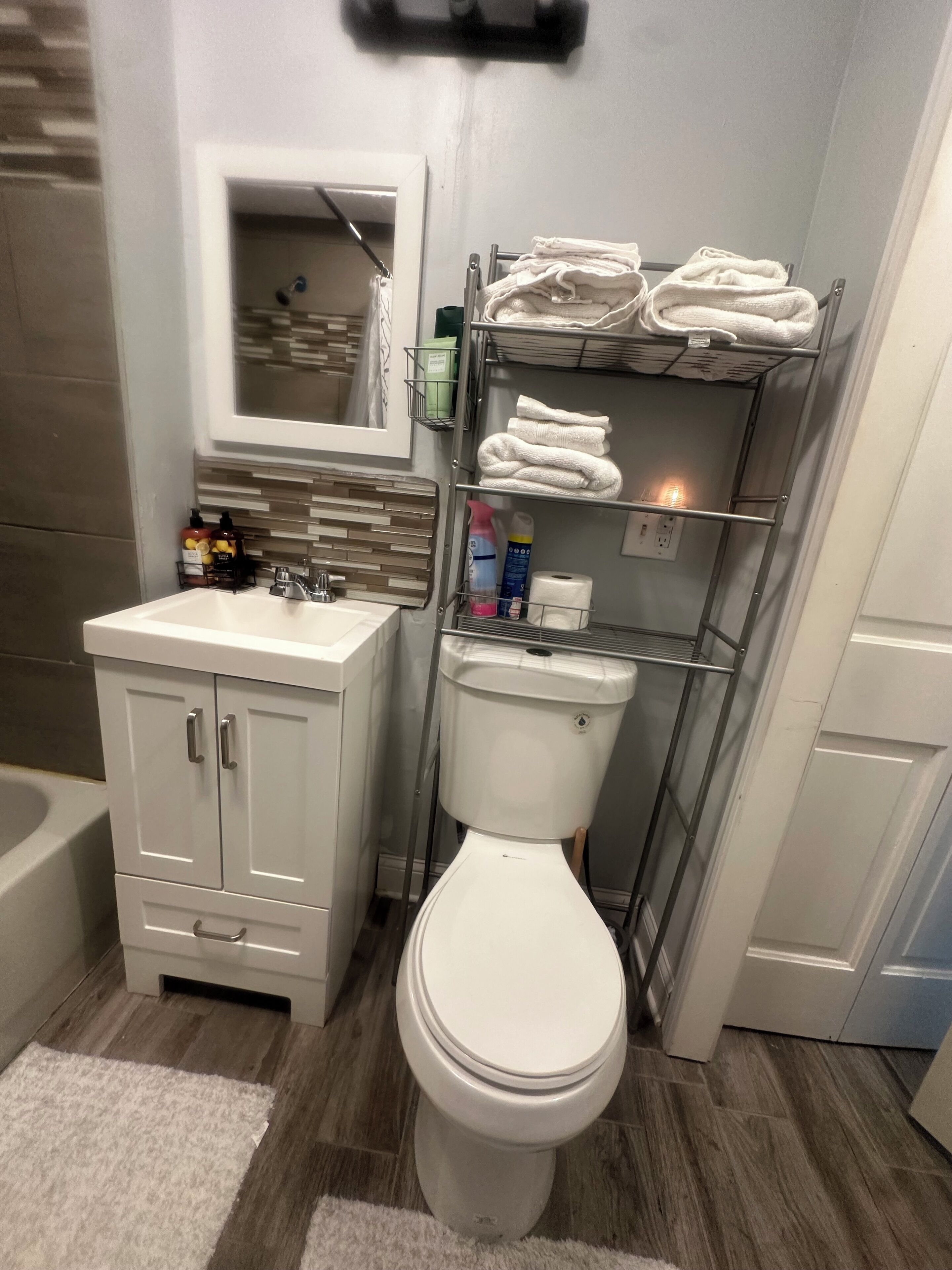 Hair dryer, towels, soap, toilet paper