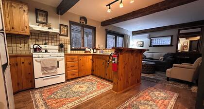 Black Bear Suite - Amazing 2BR suite with deck overlooking the Trout River & only 7 minutes to Jay Peak Resort. With Breakfast Included!