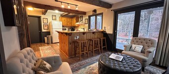 Black Bear Suite - Amazing 2BR suite with deck overlooking the Trout River & only 7 minutes to Jay Peak Resort. With Breakfast Included!