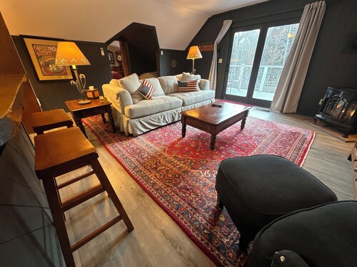 Trout River Suite - Amazing 1BR suite with deck overlooking the Trout River & only 7 minutes to Jay Peak Resort. With Breakfast Included!