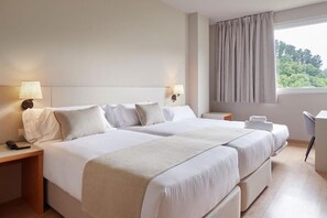 Triple Room | Down comforters, minibar, in-room safe, desk