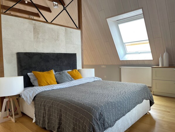 1 bedroom, desk, iron/ironing board, travel crib