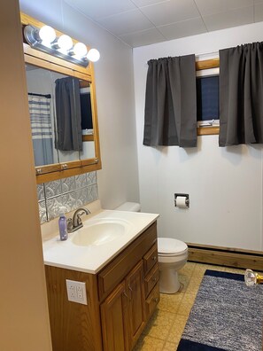 Hair dryer, towels, soap, toilet paper
