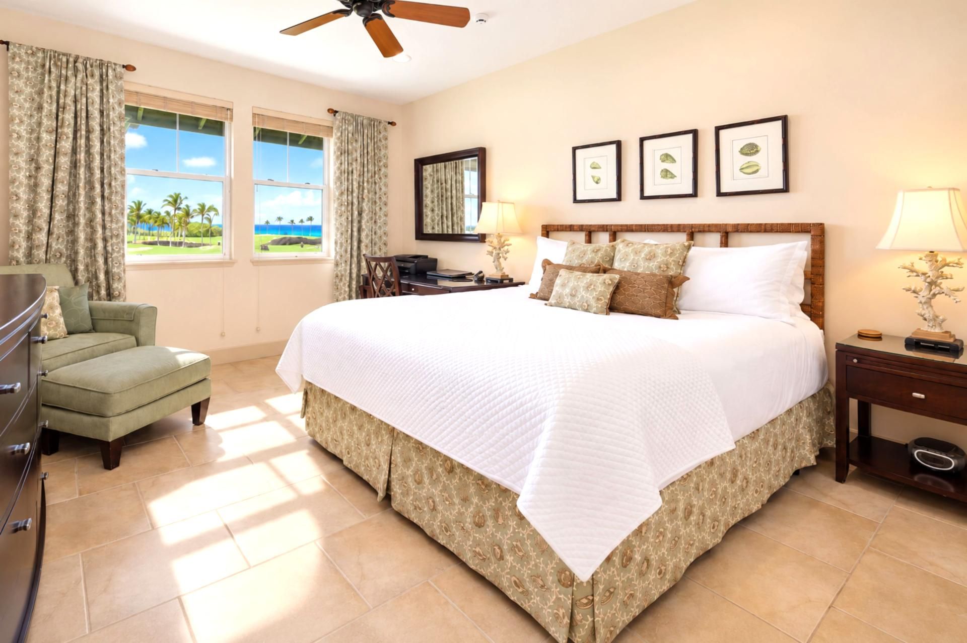 A hotel room with a large bed, a desk, a chair, and a view of the outdoors.