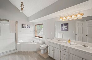 Jetted tub, hair dryer, towels, soap