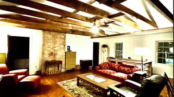 Smart TV, DVD player, foosball, books