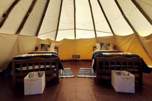 Raven Tipi, Rustic "Raven" Tipi by Bighorn Mountains