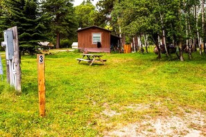 Property grounds - Steinbeck Camper, Rustic Mid-Century Camper (Story)
