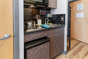 Microwave, stovetop, coffee/tea maker, toaster