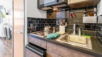 Microwave, stovetop, coffee/tea maker, toaster