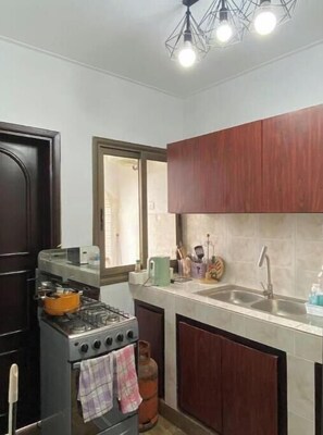 Private kitchen - Magnifique Studio Riviera Mbadon (Riviera 4 M’Badon Abidjan)