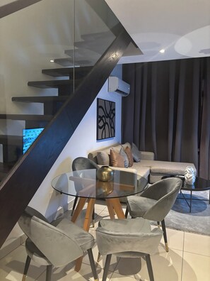 Luxury Duplex, Balcony | Living area | Flat-screen TV - Embassy Gardens premier home (Accra)