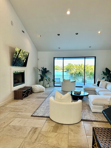 Waterfront Luxury Home w 5 bd-5.5 bath, private pool situated on 1 acre property