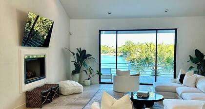 Waterfront Luxury Home w 5 bd-5.5 bath, private pool situated on 1 acre property